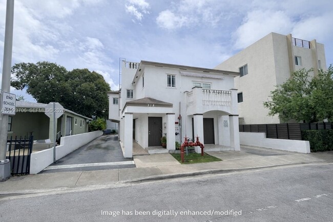 property at 318 E 6th St