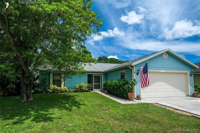 property at 4063 SE Jacaranda St