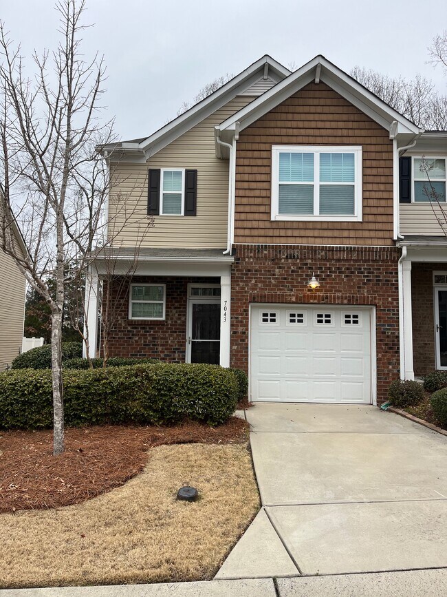 property at 7043 Woodsbay Lane