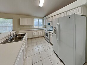 13815 Riverpath Grove Dr in Orlando, FL - Foto de edificio - Building Photo