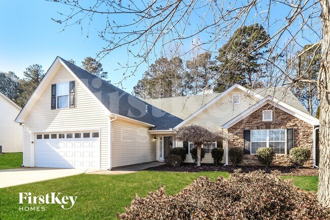 1099 Harbins Pass Dr in Dacula, GA - Foto de edificio - Building Photo