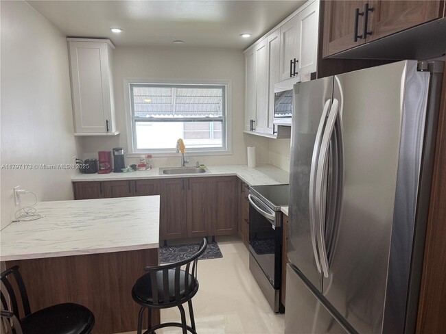property at 825 NE 6th St