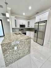 3596 64th Ave NE in Naples, FL - Foto de edificio - Building Photo