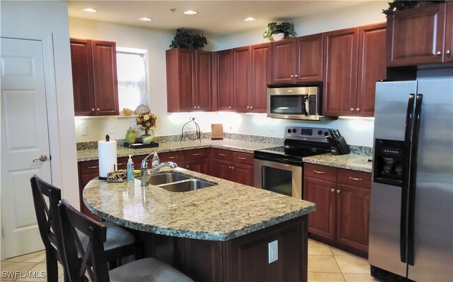 5076 Annunciation Cir in Ave Maria, FL - Foto de edificio - Building Photo