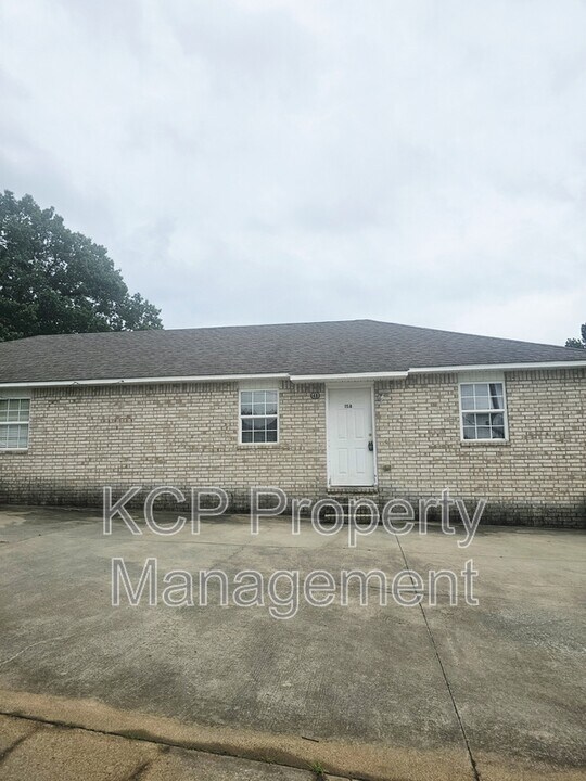 115 Wilson St in Roland, OK - Building Photo