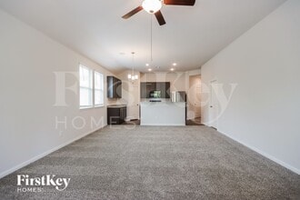 245 Rd 5102F, Unit 05-03 in Cleveland, TX - Foto de edificio - Building Photo