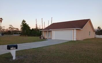 11907 Country Club Dr in Panama City, FL - Foto de edificio - Building Photo