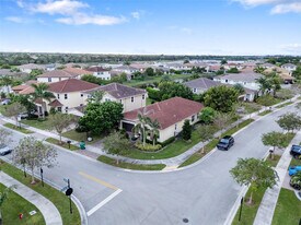 9741 S Miralago Way in Parkland, FL - Building Photo