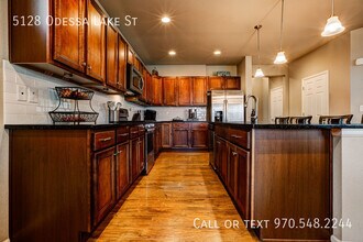 5128 Odessa Lake St in Timnath, CO - Building Photo - Building Photo