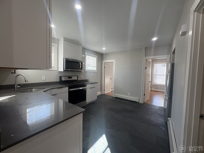 23 Elmer St, Unit 1 in Cambridge, MA - Foto de edificio - Building Photo