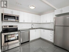 408-3101 EGLINTON Ave in Toronto, ON - Building Photo - Building Photo