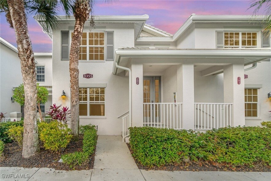 8355 Whisper Trace Way, Unit 202 in Naples, FL - Building Photo