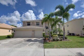 7553 Greenville Cir in Greenacres, FL - Building Photo - Building Photo