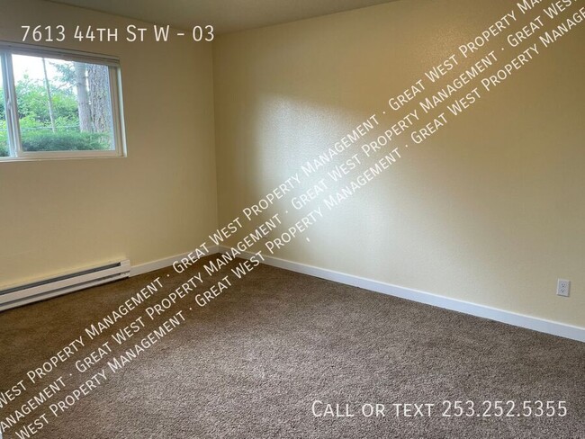 7613 44th St W-Unit -03 in University Place, WA - Foto de edificio - Building Photo