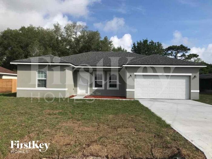 405 Jay Ct in Poinciana, FL - Building Photo