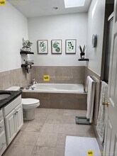 153 D St, Unit 1 in Boston, MA - Building Photo - Building Photo