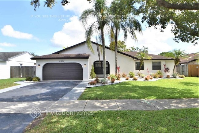 property at 11521 SW 52nd St