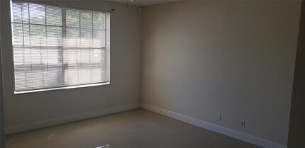 11211 W Atlantic Blvd, Unit 105 in Coral Springs, FL - Building Photo - Building Photo