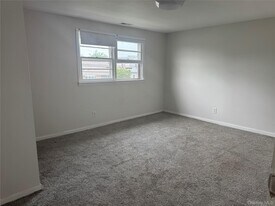 124 Parkdale Dr in North Babylon, NY - Building Photo