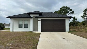 5901 Rita Ave N in Lehigh Acres, FL - Building Photo