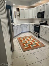 7048 Pelican Bay Blvd in Naples, FL - Building Photo - Building Photo