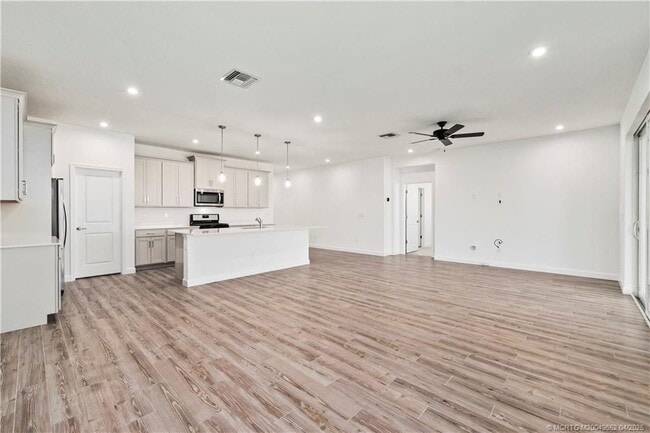 property at 14143 SW Safi Ter