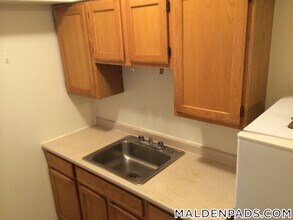 17-19 Washington St., Unit 408 in Malden, MA - Building Photo - Building Photo