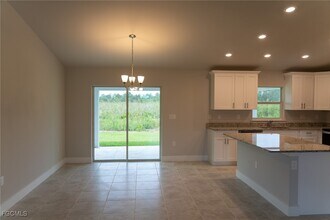 409 Moore Ave in Lehigh Acres, FL - Building Photo - Building Photo