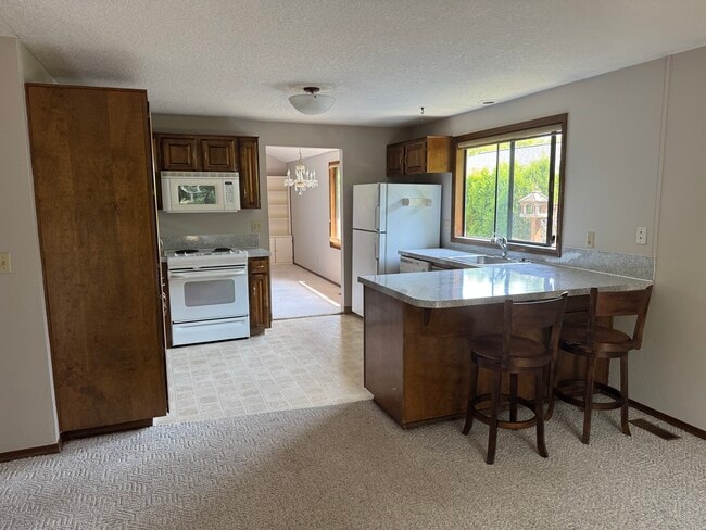 property at 14220 SW Daphne St