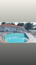 6760 N Pine Island Rd in Tamarac, FL - Building Photo - Building Photo