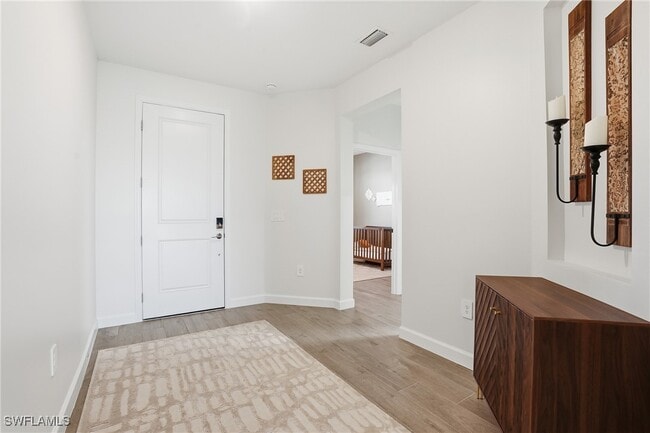 19306 Hinkley Dr in Estero, FL - Building Photo - Building Photo