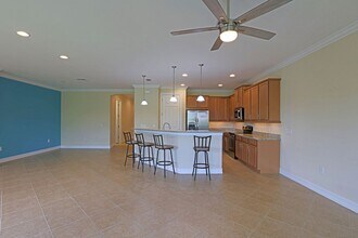 8100 Banyan Breeze Way in Ft. Myers, FL - Building Photo - Building Photo