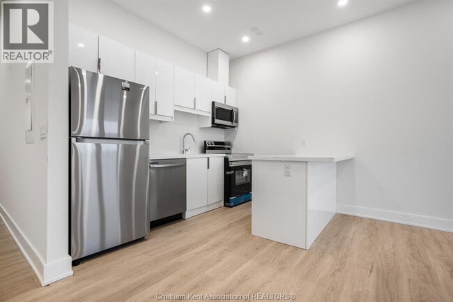 property at 153 King St W