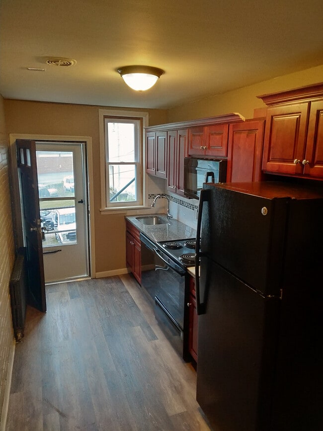 property at 228 W 3rd St