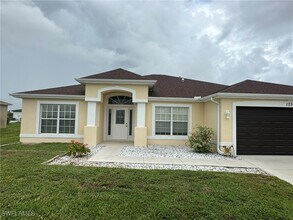 1334 NW 15th Pl in Cape Coral, FL - Building Photo - Building Photo