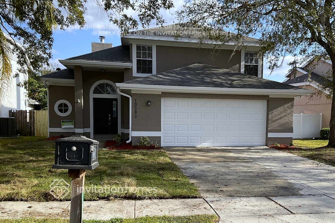 10592 Satinwood Cir in Orlando, FL - Building Photo