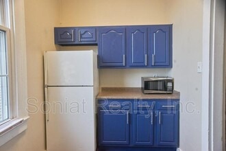 4151 Canal St, Unit 1 in New Orleans, LA - Foto de edificio - Building Photo