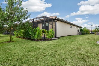 14059 Winding Cedar Wy in Miromar Lakes, FL - Building Photo - Building Photo