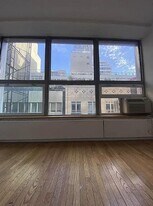 102 Fulton St in New York, NY - Building Photo