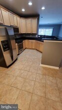 9713 Handerson Pl-Unit -302 in Manassas Park, VA - Building Photo - Building Photo