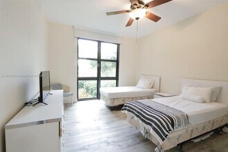 1121 Crandon Blvd, Unit E108 in Key Biscayne, FL - Building Photo - Building Photo