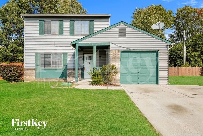 property at 7736 Woods Crossing Ave