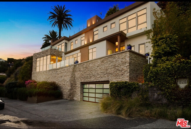 property at 8271 Woodshill Trail
