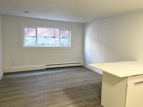 Qute Place in Edmonton, AB - Building Photo - Building Photo