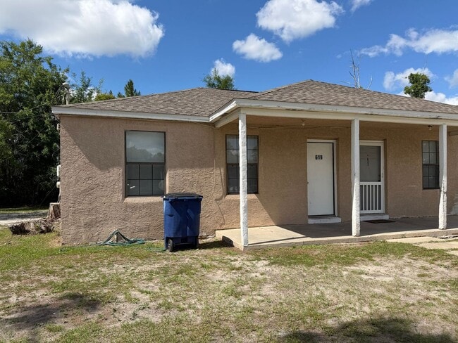 property at 619-621 E 13th St