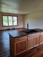 1202 Mosinee Ave-Unit -1/2 in Mosinee, WI - Foto de edificio - Building Photo