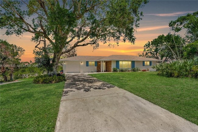 property at 9125 SE Karin St