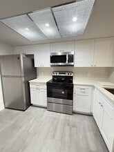5015 Wiles Rd in Coconut Creek, FL - Building Photo - Building Photo