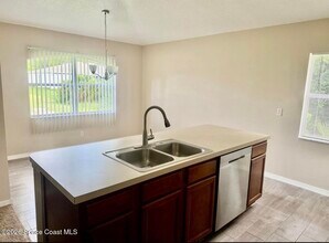 1072 Flintlock Ave SE in Palm Bay, FL - Building Photo - Building Photo