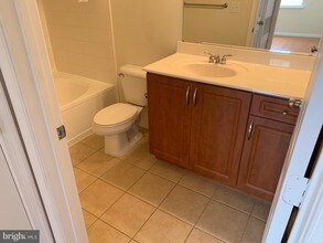 12913 Centre Park Cir-Unit -411 in Herndon, VA - Building Photo - Building Photo